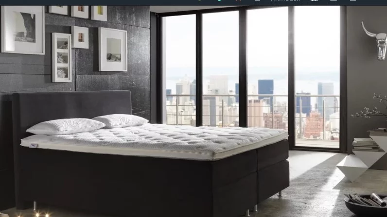 Modernes Hotelzimmer im Das Stue Berlin mit hochwertigem Boxspringbett und Matratze von ergomed®